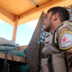 On October 7th, a fighter from the U.S.-backed Kurdish-led Syrian Democratic Forces, SDF, stands guard inside a post where U.S. troops were based, in Tal Abyad. Tal Abyad is currently under attack by Turkish air and artillery.